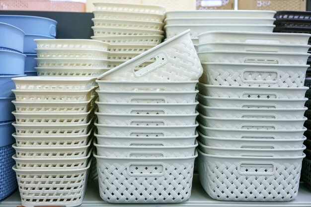 Plastic baskets on the shelf in the store