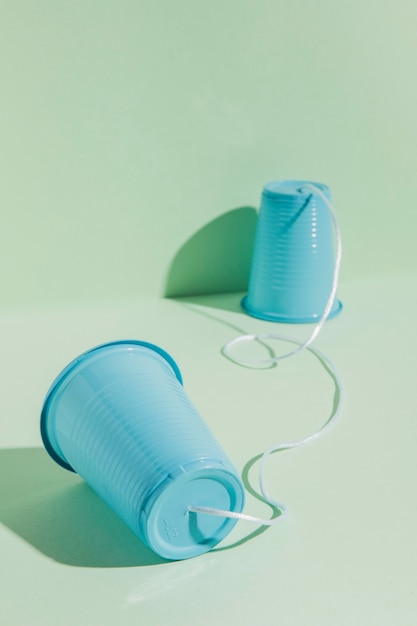 Plastic cups attached with string