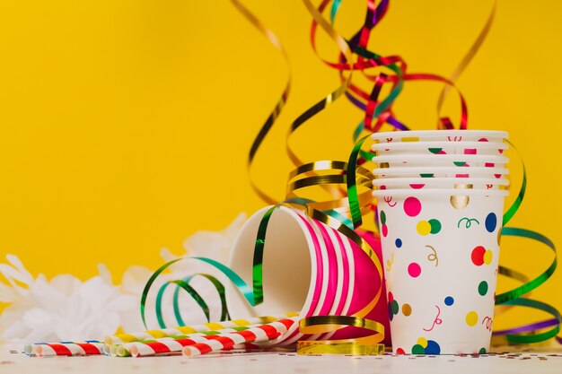 Plastic cups with serpentine and confetti