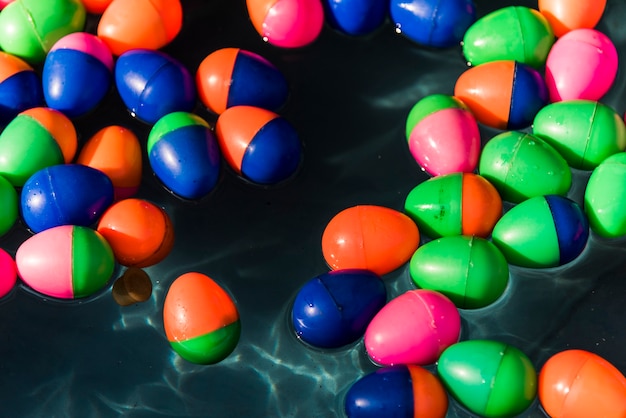 Plastic eggs floating in water