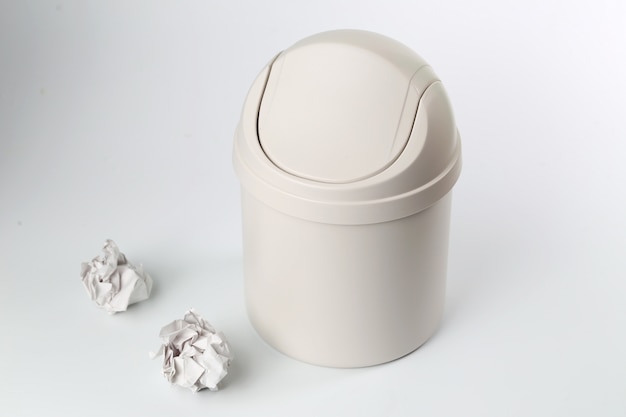 Free photo plastic trash can on white background