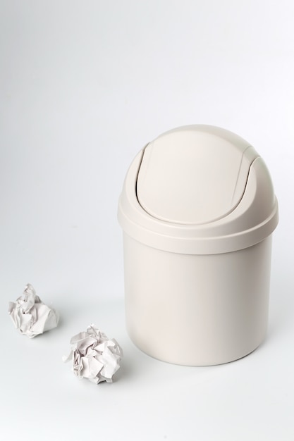 plastic trash can on white background
