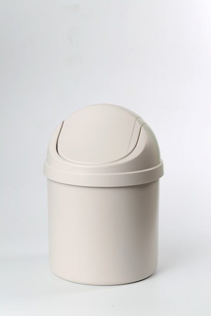 plastic trash can on white background
