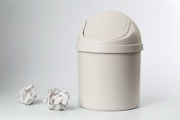 plastic trash can on white background