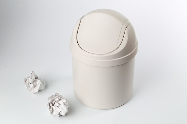 plastic trash can on white background