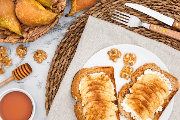 Plat with toast and basket of pears