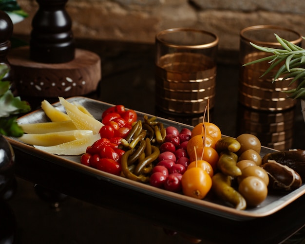 Plate of different selection of homemade marinated vegetables, turshu