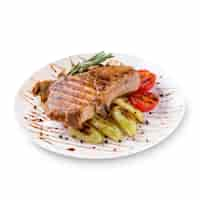 Free photo plate of grilled steak meat with vegetables on white background. photo for the menu