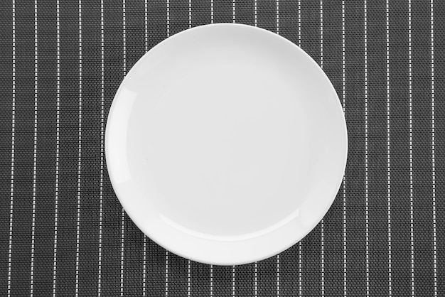 Free photo plate mat with plate fork and knife