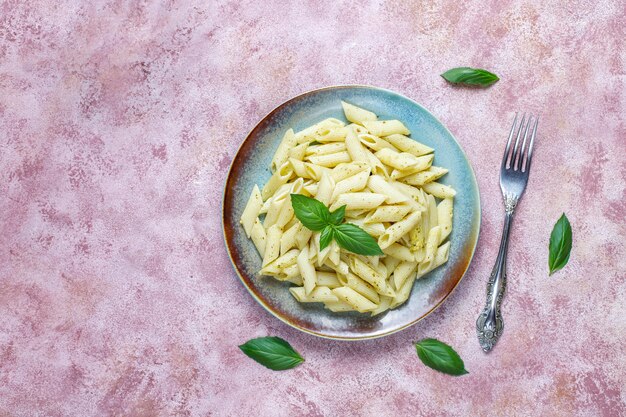 Plate of pasta with homemade pesto sauce.
