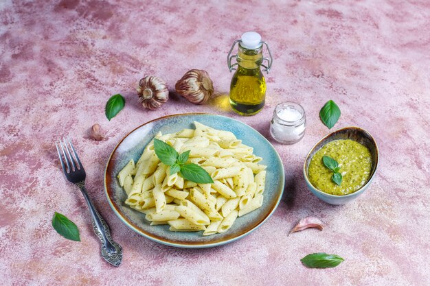 Plate of pasta with homemade pesto sauce.