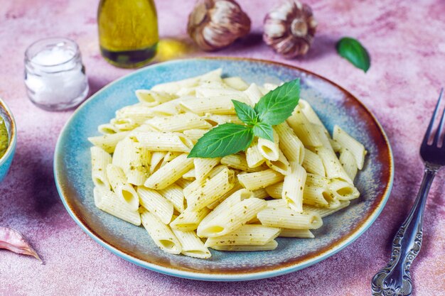 Plate of pasta with homemade pesto sauce.