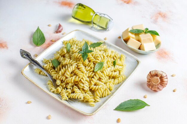 Plate of pasta with homemade pesto sauce.