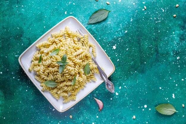 Plate of pasta with homemade pesto sauce.