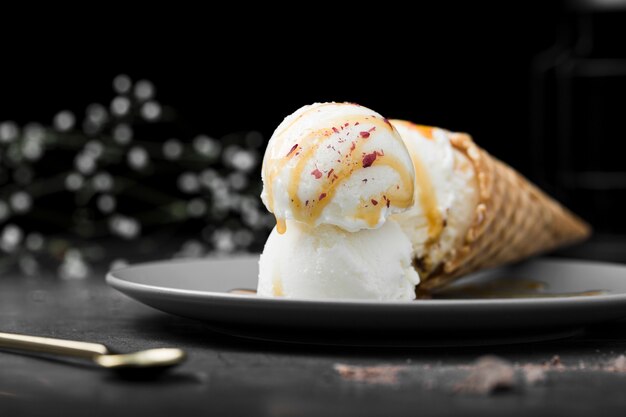 plate with ice cream with topping