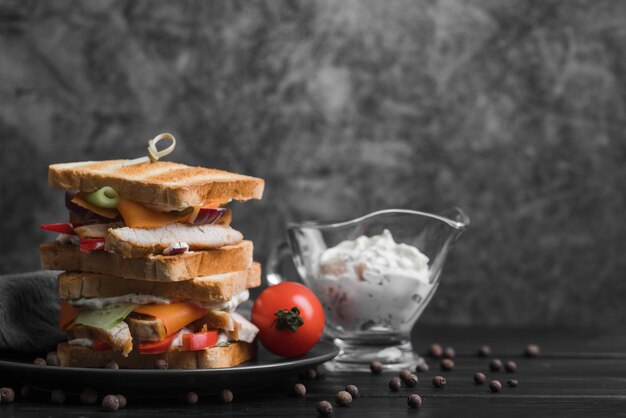 Free photo plate with toast sandwiches on table