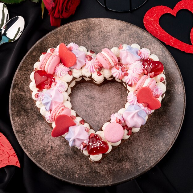 Plate with valentines day heart-shaped cake