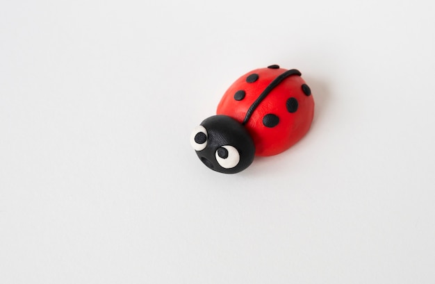 Free photo play dough background with bug