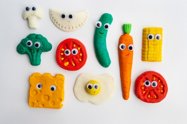 play dough background with vegetables