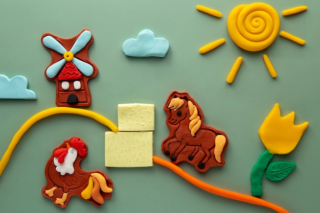 Free photo playdough art with farm animals