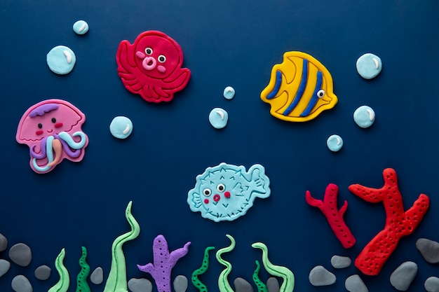 Playdough art with fish and algae