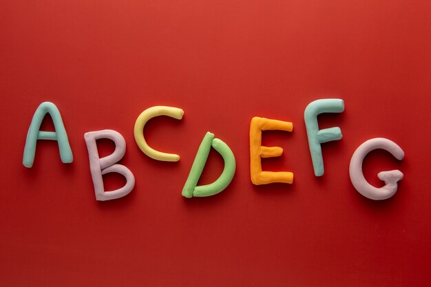 Playdough art with letters flat lay