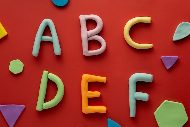 Free photo playdough art with letters top view