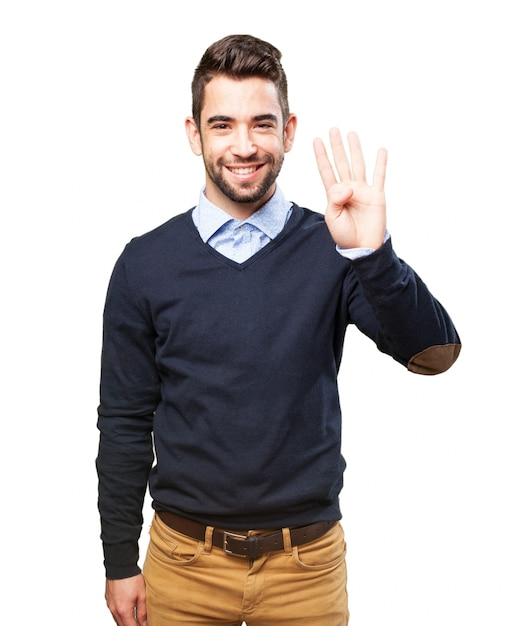 Playful boy showing four fingers