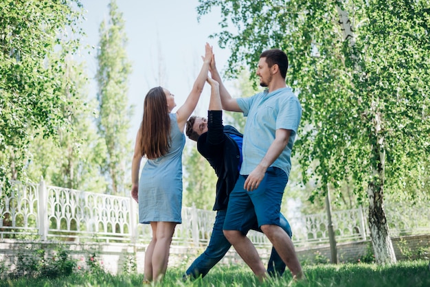 Playful friends giving high five