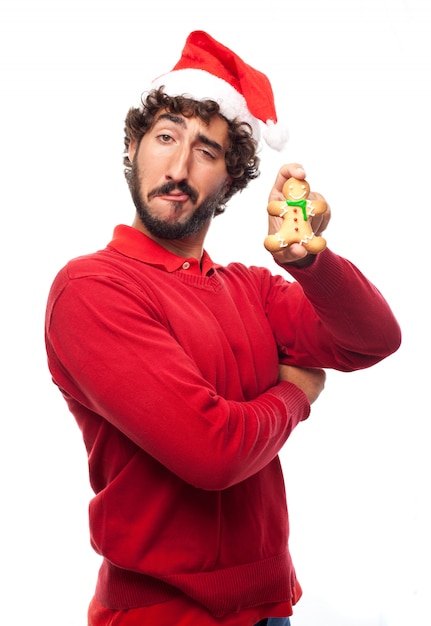 Playful man with a gingerbread