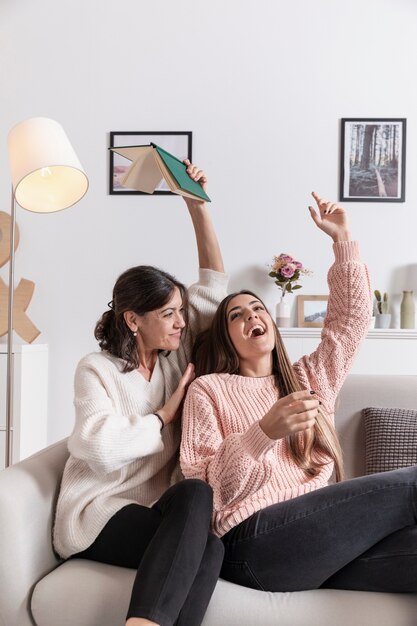 Playful mom and daughter