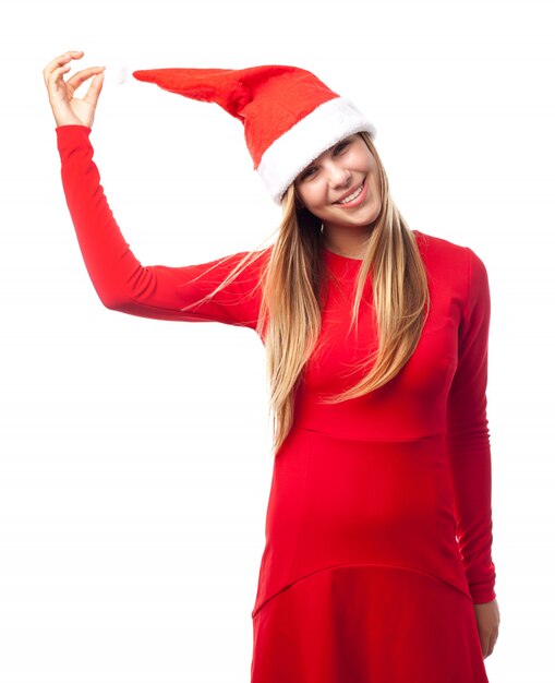 Playful teen with a santa hat