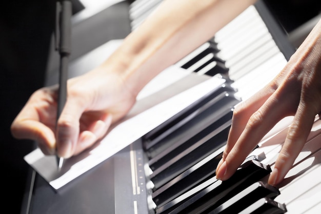 Playing piano close up