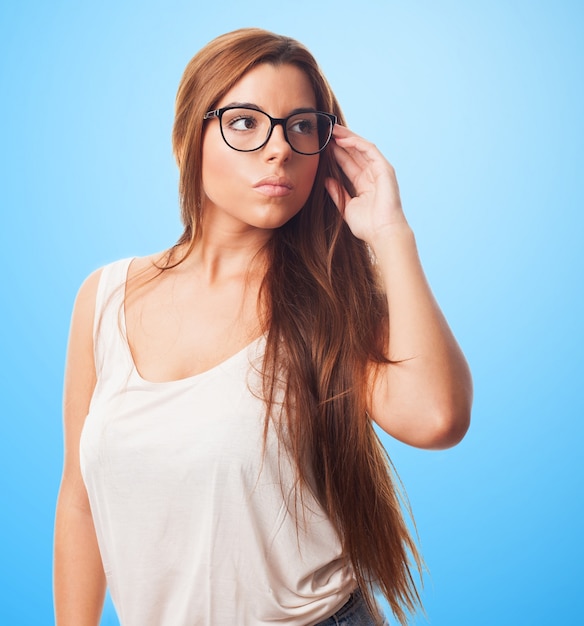 Pleasant female in eyeglasses.