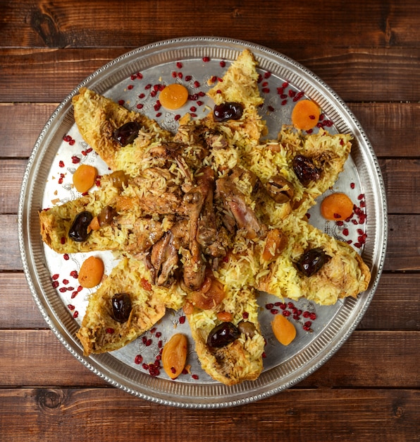 Plov with meat on the table