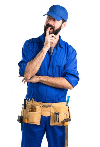 Free photo plumber doing surprise gesture