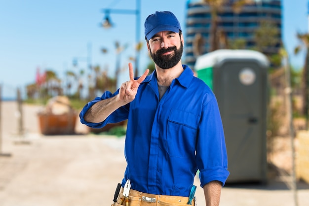 Plumber doing victory gesture