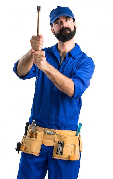 Plumber holding a hammer