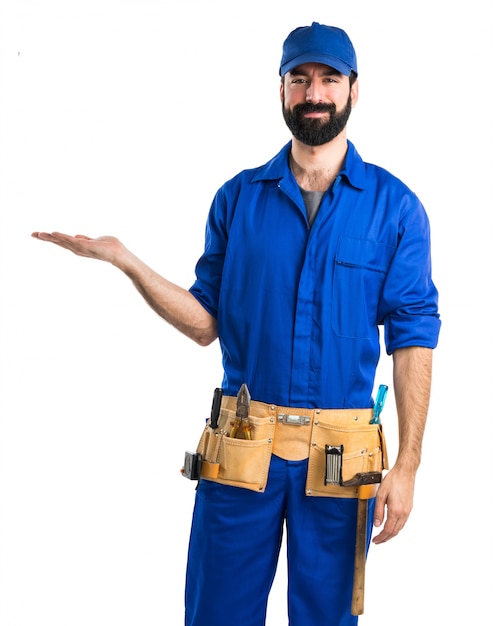 Free Photo | Plumber holding something