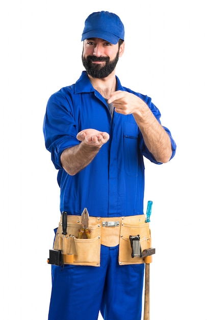 Plumber holding something