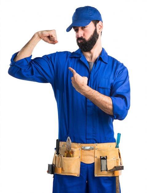 Free photo plumber making strong gesture