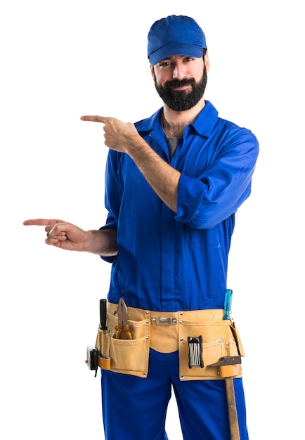 Plumber pointing to the lateral