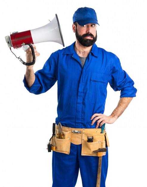 Free photo plumber shouting by megaphone