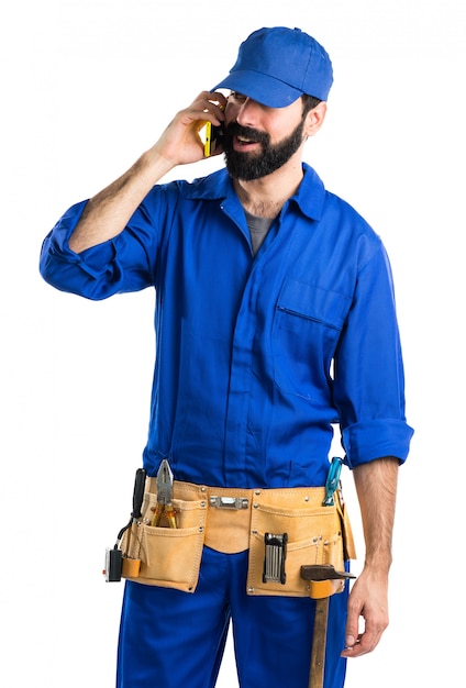 Plumber talking to mobile