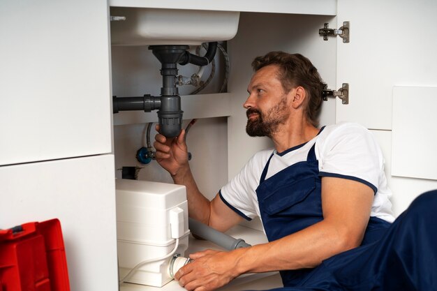 plumbing professional doing his job