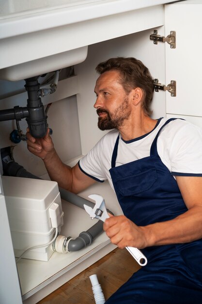 Plumbing professional doing his job