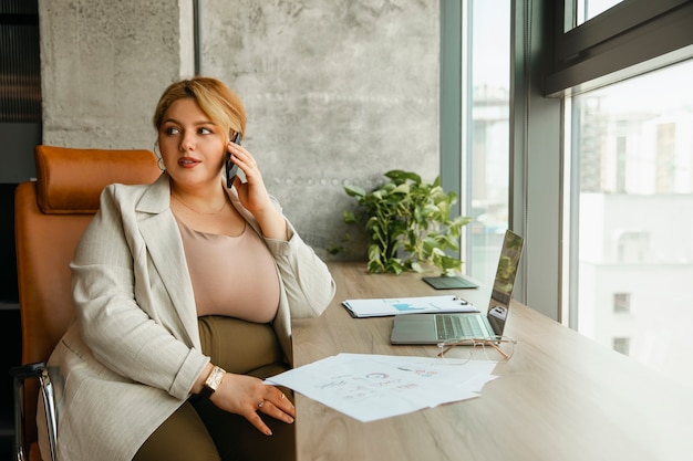 Plus-size business woman working in a professional office