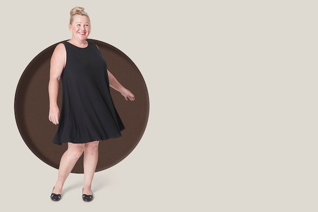 Free photo plus size fashion woman posing with black dress, copy space