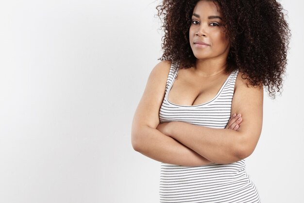 Plus size woman with curly african hair