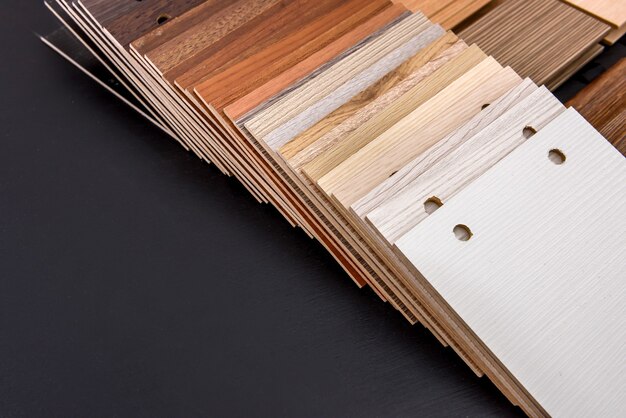 Download Premium Photo | Plywood sampler in fan at wooden desk close up